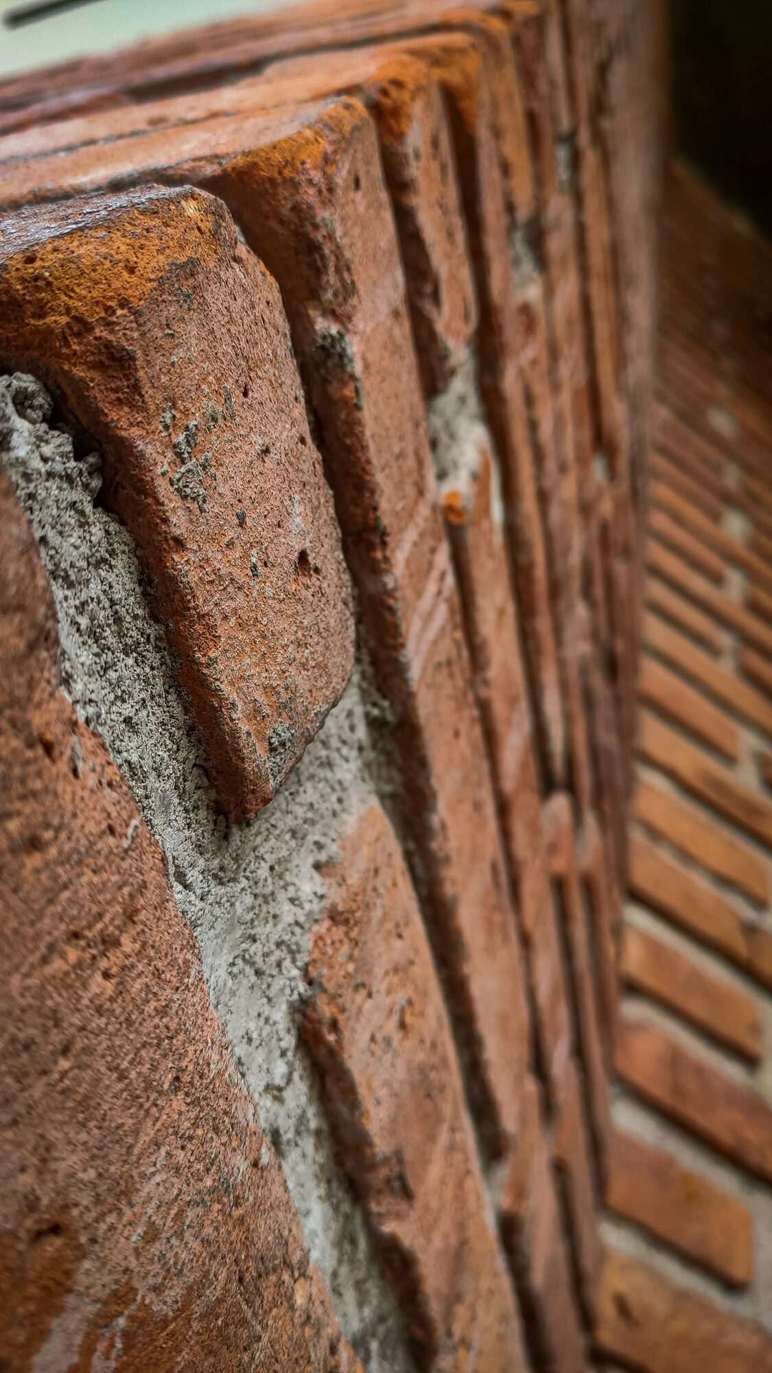 Historic building facade showing successful restoration with cleaned and sealed masonry surfaces, demonstrating quality craftsmanship